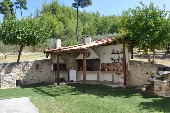 Traditional wood-fired oven and barbecue facilities at Ktima Verde in Paliouri Chalkidiki