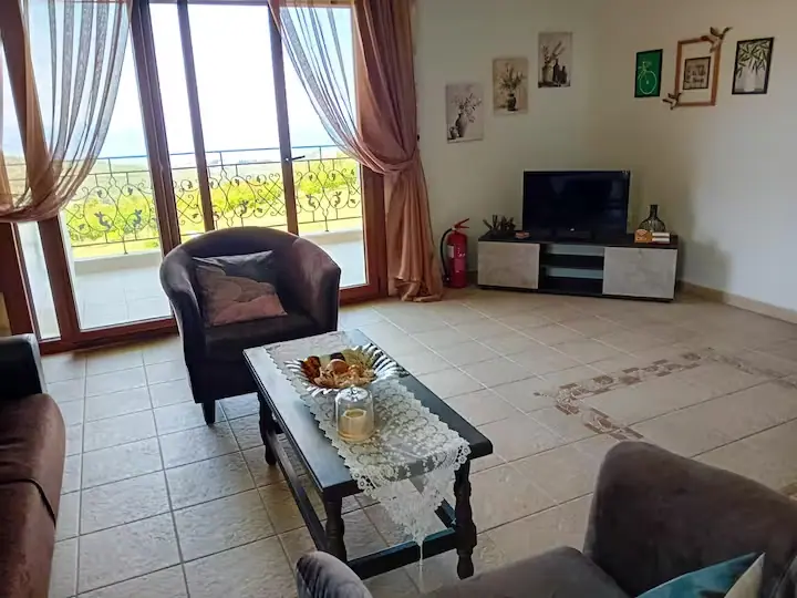 Spacious and bright living room area at Ktima Verde apartment in Paliouri Kassandra