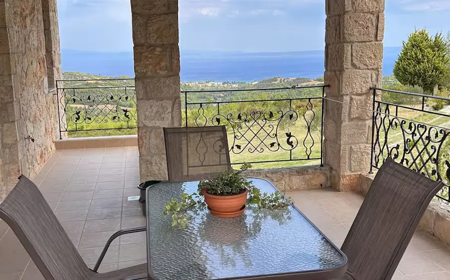 Balcony view with sea and table at Ktima Verde Paliouri Chalkidiki